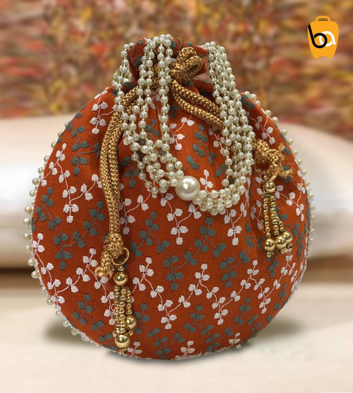 Designer Floral Pearl Potlis