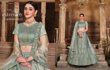Load image into Gallery viewer, Beautiful Net and Satin Silk Lehengas