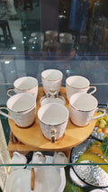 Porcelein Cups with revolving base
