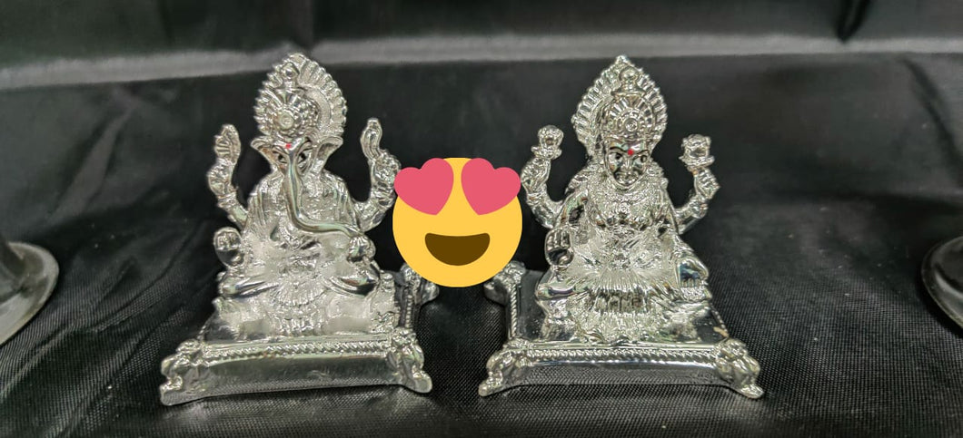 Silver coated Ganesh and Lakshmi Idol